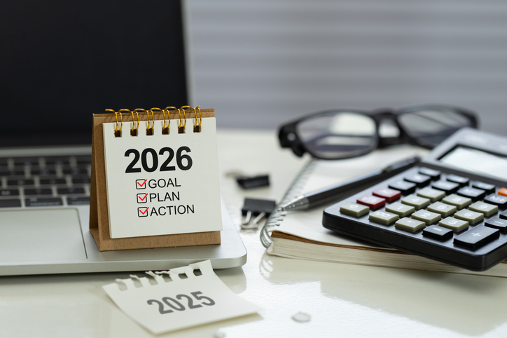 Desk calendar 2026 with checklist Goal, Plan, Action on office workspace to represent using AI and Tech Startup course coupons for the New Year.